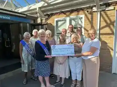 Cheque presentation outside Chard Community Hospital supporting Promise Works